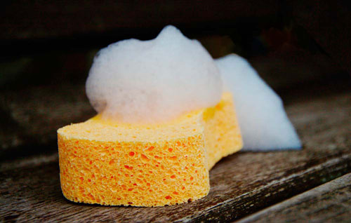 Cleaning foam for surface disinfection on a sponge