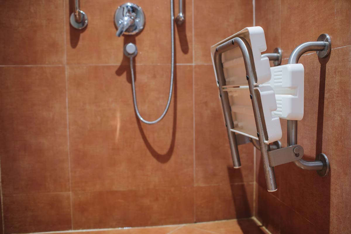 Fold-down shower chairs can be securely installed in the shower