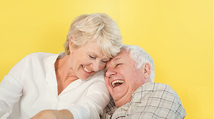 Happy senior couple thanks to care products for a carefree life