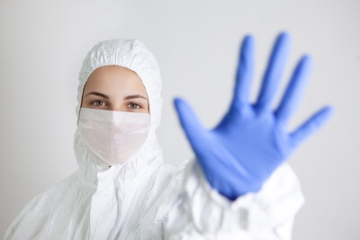 Woman wearing infection protection clothing Infection Protection Clothing