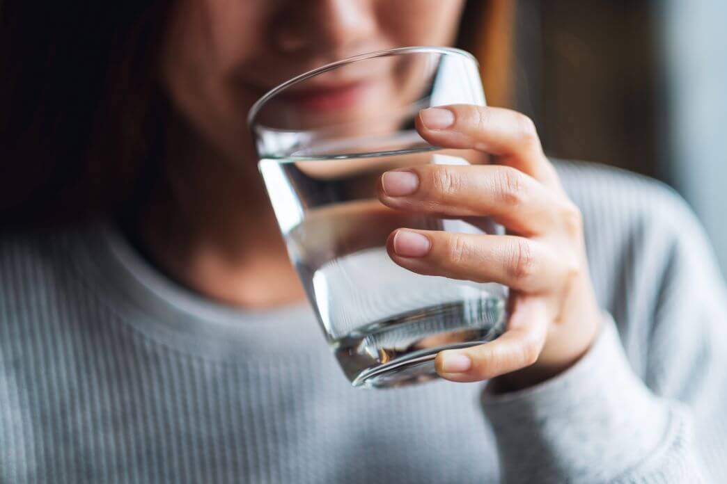 Colloidal Silver – Application, Mode of Action & Production Colloidal silver is drunk by woman to alleviate discomfort